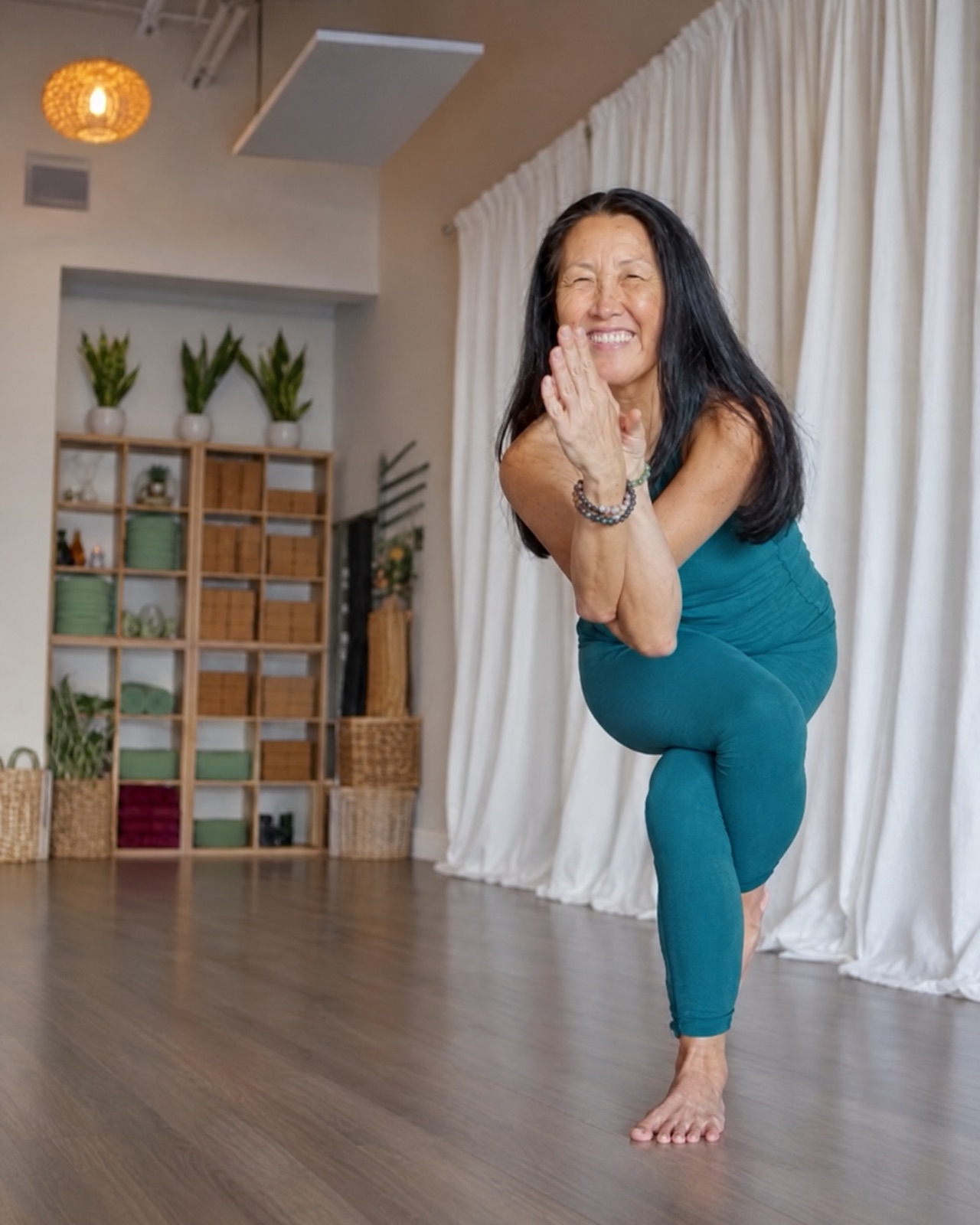 Judy Weaver smiling in a standing balance at GRO Boca